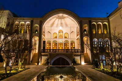 Exterior of illuminated building at night