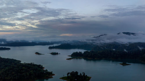 Aerial view of kenyir lake during blue hour sunrise.