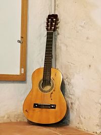 Close-up of guitar at home