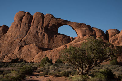 Rock formations against clear sky