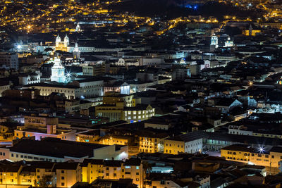 High angle view of illuminated buildings in city