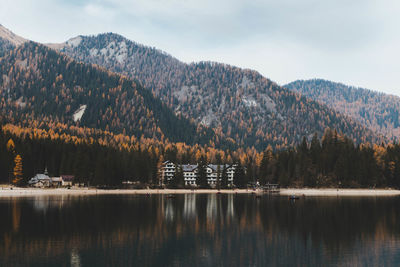 Scenic view of lake and mountains against sky