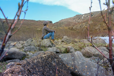 Full length of man standing on mountain