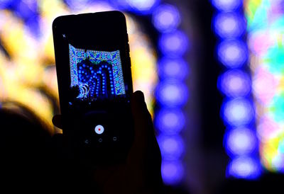 Close-up of illuminated smart phone at night