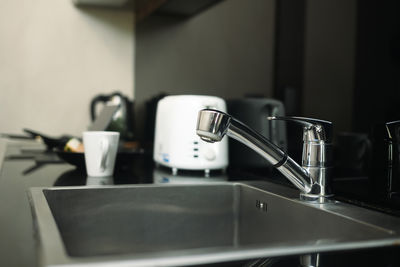 Close-up of sink in bathroom