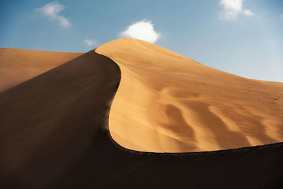 Scenic view of desert against sky