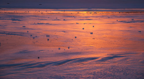 Scenic view of sea at sunset