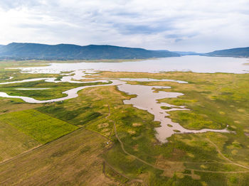 Scenic view of land against sky