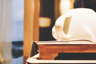 Close-up of coffee cup on table in restaurant