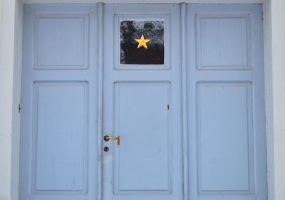 Close-up of star shape on door