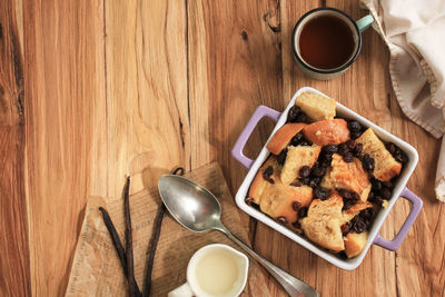 Top view vanilla cinnamon raisin bread and butter pudding 