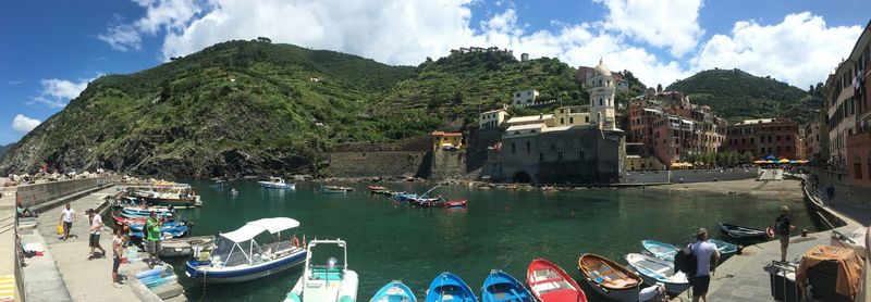 Panoramic view of sea and buildings against sky