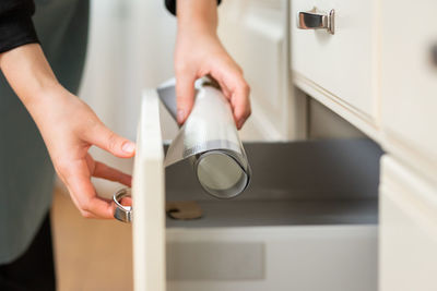 Midsection of man washing hands