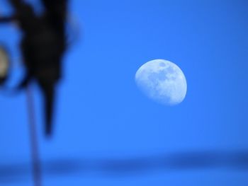 Close-up of moon against clear blue sky