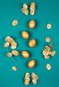 High angle view of candies against blue background