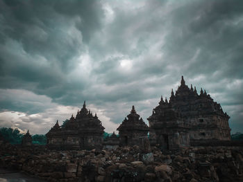 Historic building against cloudy sky