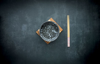 High angle view of bread on black background