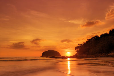 Scenic view of sea at sunset