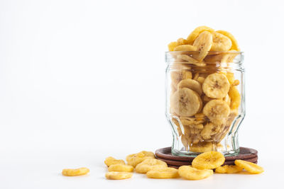 Close-up of food on table against white background