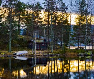 Scenic view of lake at sunset