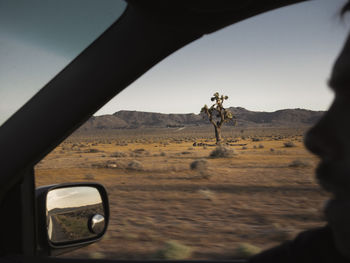 Landscape seen through car window