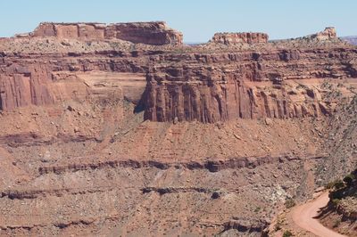 Low angle view of rock formation against sky