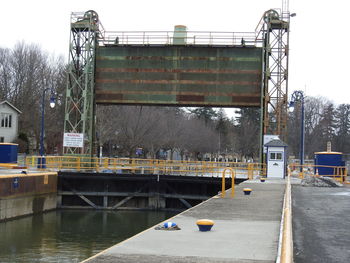 View of bridge over canal in city