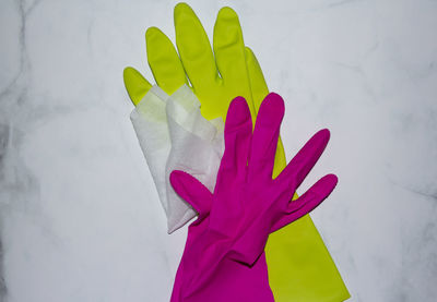 High angle view of human hand against white background