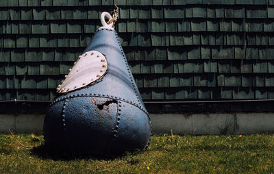 Close-up of old shoes on field