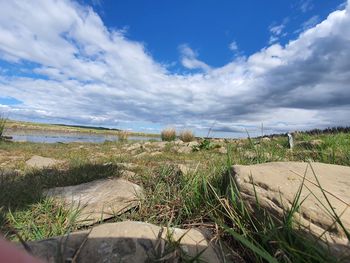 Scenic view of land against sky