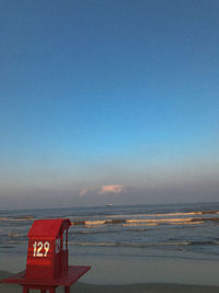 Scenic view of sea against clear blue sky