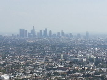 Cityscape against clear sky