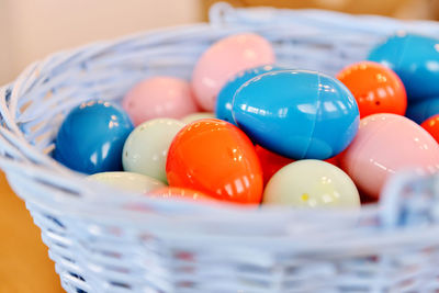 Close-up of multi colored eggs in bowl