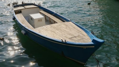 High angle view of boats moored in lake