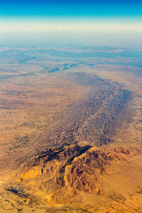 High angle view of land against sky