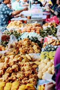 Fried food for sale at market stall