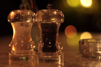 Close-up of salt pepper shaker on table