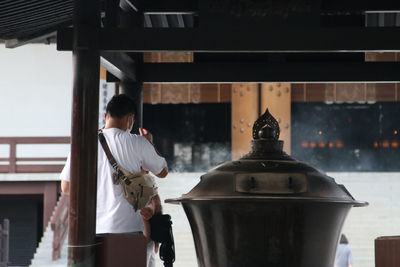 A man praying in his jinja