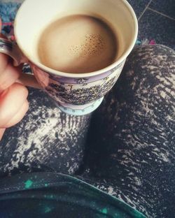 Close-up of woman holding tea cup