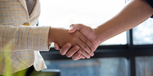 Close-up of man holding hands