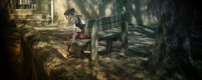 Woman sitting on bench 