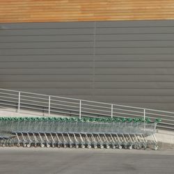 Shopping carts against building