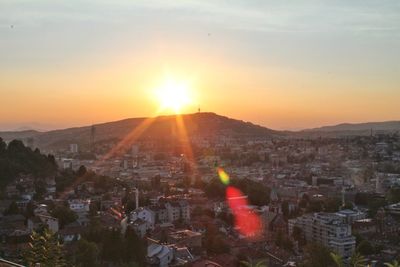 High angle view of townscape against sky during sunset