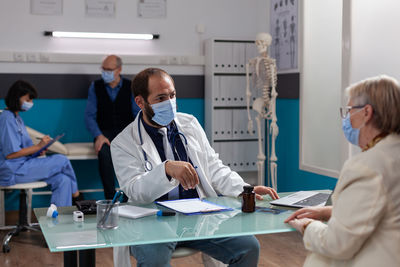 Female friends working at clinic