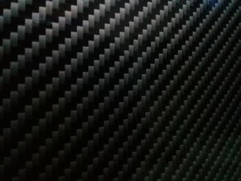 Full frame shot of metal grate against black background
