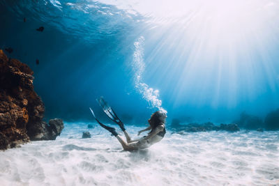 Man swimming in sea