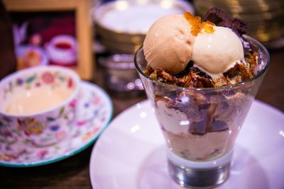 Close-up of ice cream in glass on table