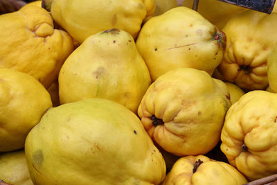 Full frame shot of quinces for sale in market
