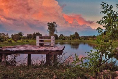 Scenic view of lake against sky during sunset