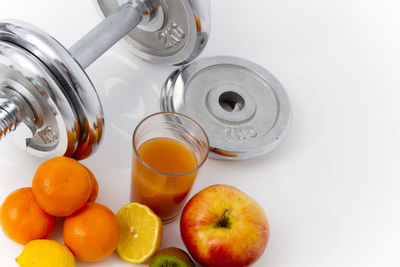 High angle view of oranges on white background